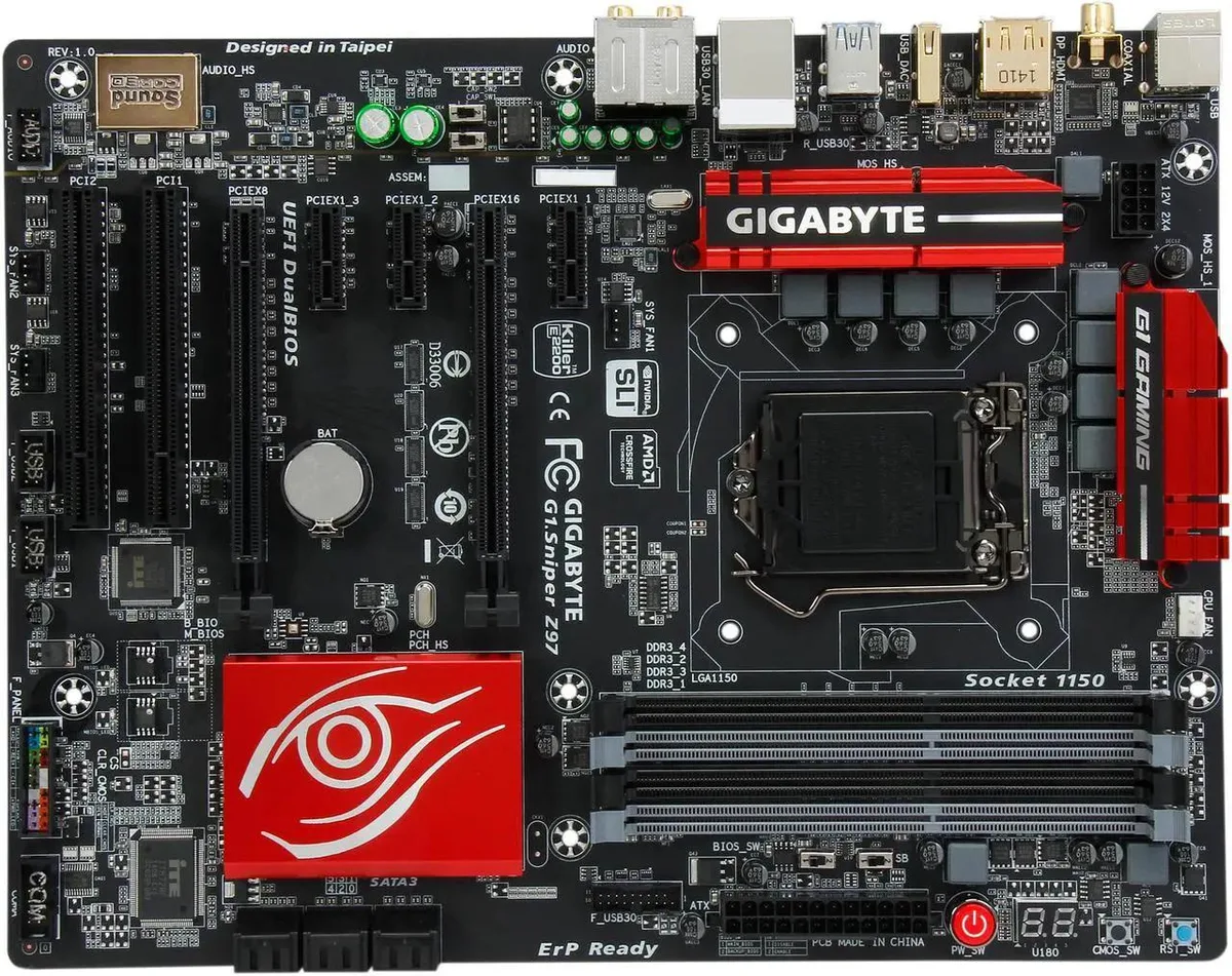 ATX motherboard with black PCB, metallic heatsinks, LGA 1150 socket, four DDR3 slots, PCIe x16 and x1 slots, SATA ports
