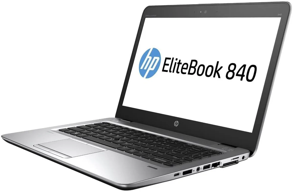 Silver 14 inch business laptop with matte finish and compact keyboard