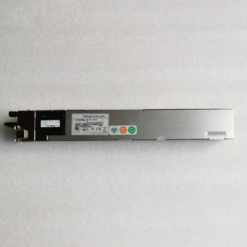 Rectangular black ATX power supply unit with gold certification badge