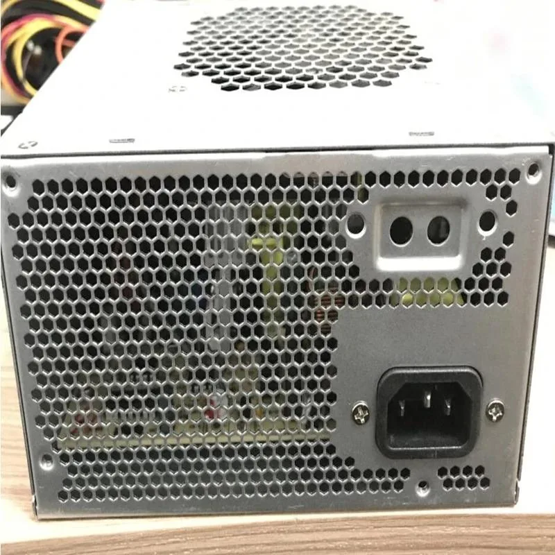 Rectangular ATX power supply unit with matte black metal casing and rear exhaust fan grille