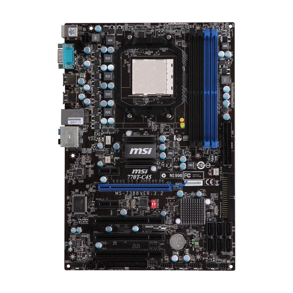 Green ATX motherboard with silver heatsinks, black slots and rear I/O panel