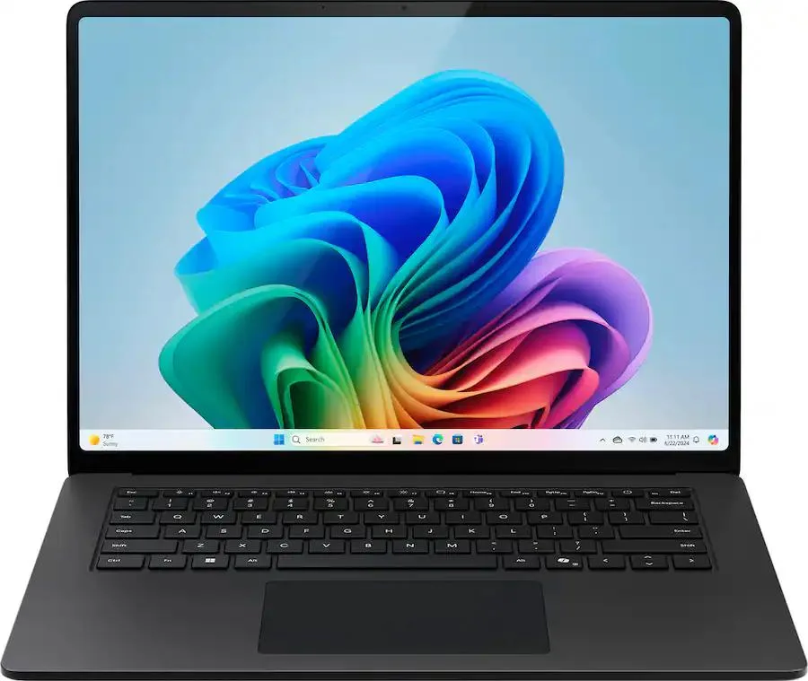 Black 15 inch touchscreen laptop with thin bezels and backlit keyboard