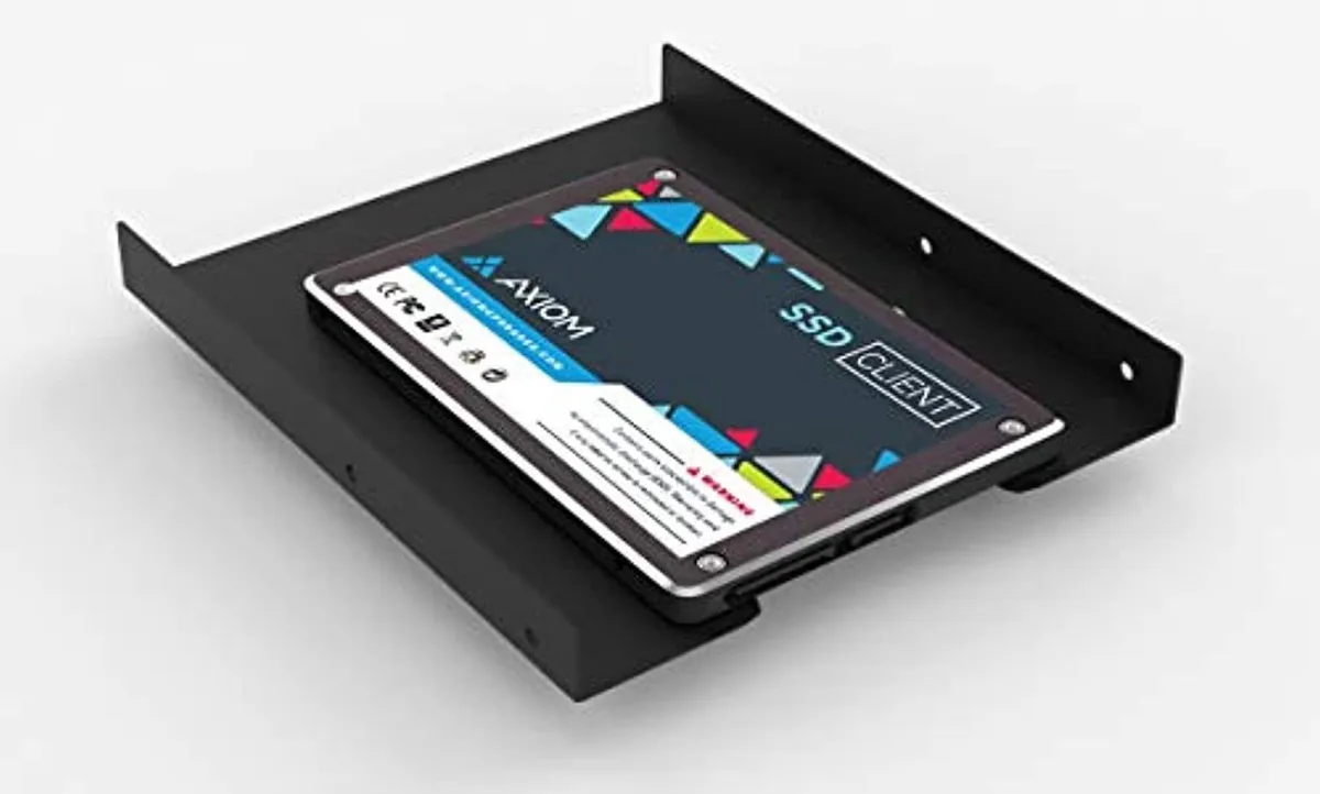 Silver 2.5 inch SSD in a black 3.5 inch carrier with SATA connectors
