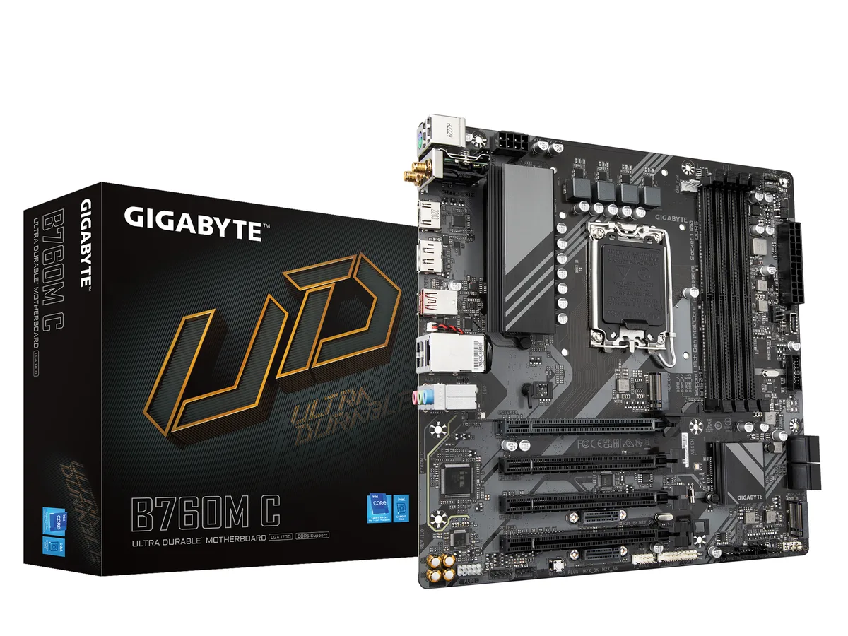 Green rectangular mATX board with silver CPU socket cover, four black DDR5 slots, large silver heatsink, and black PCIe slots