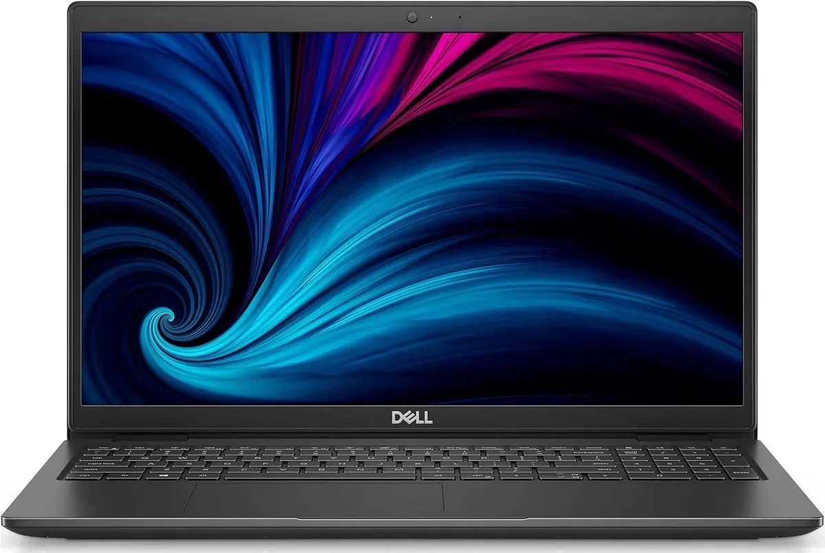 Black Dell Latitude 3520 laptop closed on a plain surface