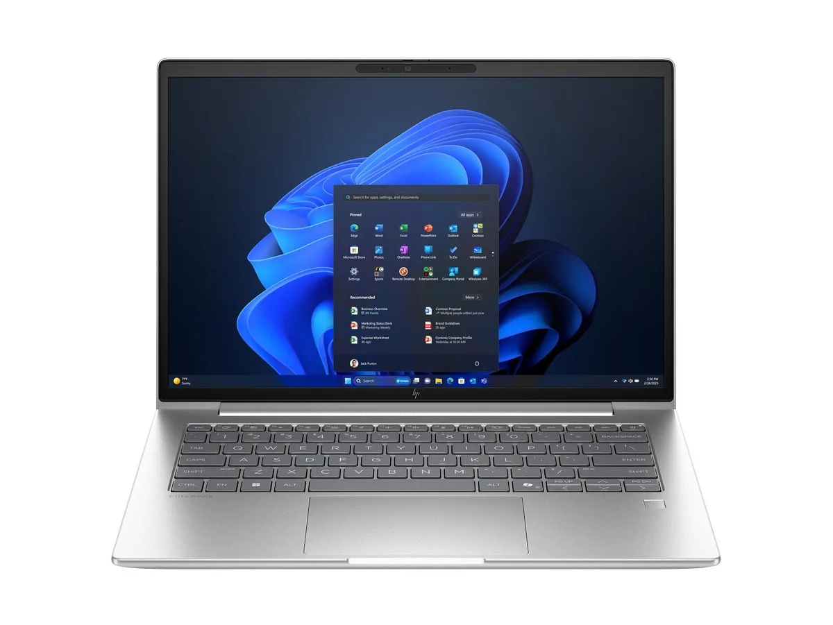 Silver 14-inch business laptop, thin tapered profile, matte finish