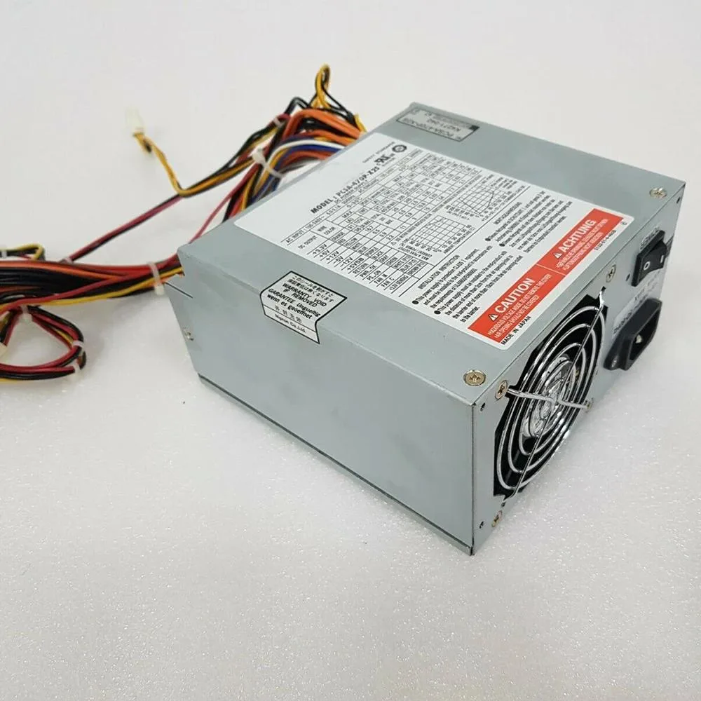 Rectangular silver ATX power supply unit with fan grille