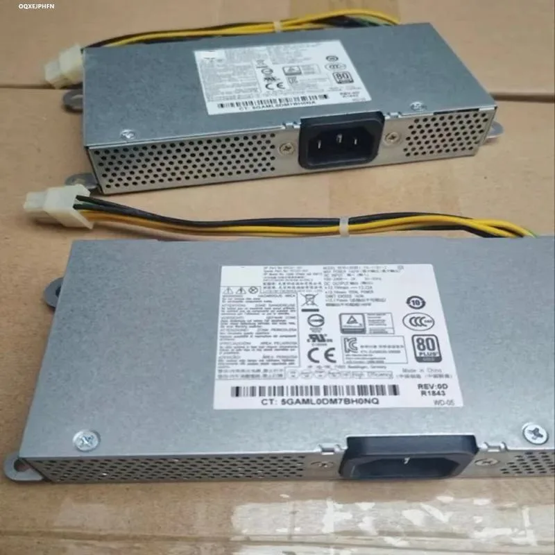Rectangular metal ATX power supply unit with a matte finish and visible cooling fan grille