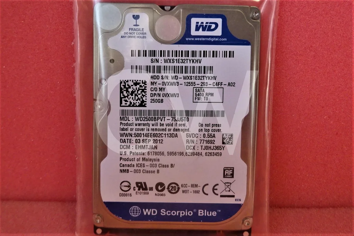 Silver 2.5 inch SATA hard drive with circuit board visible