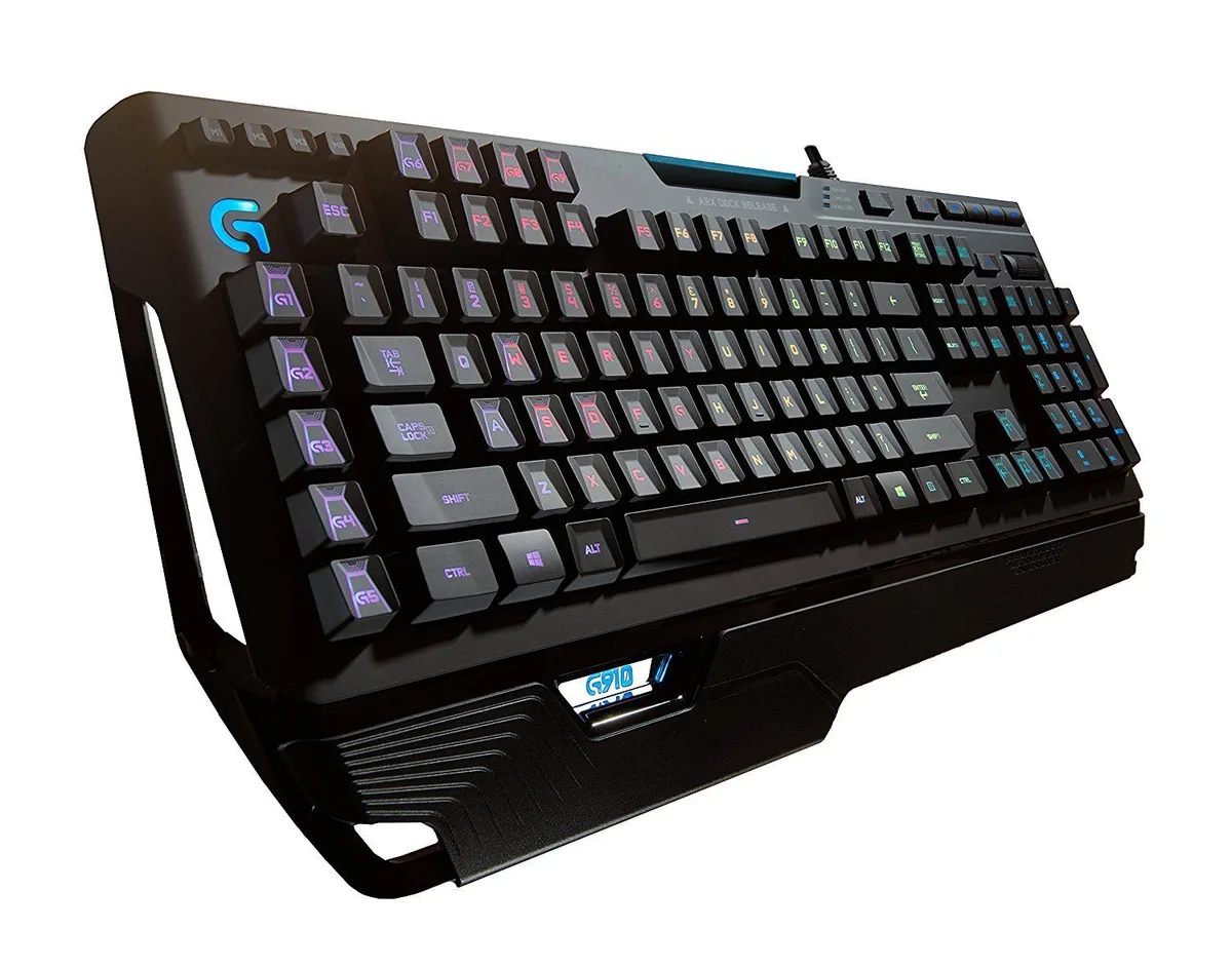 Black wired mechanical gaming keyboard with RGB backlighting, palm rest and dedicated media controls