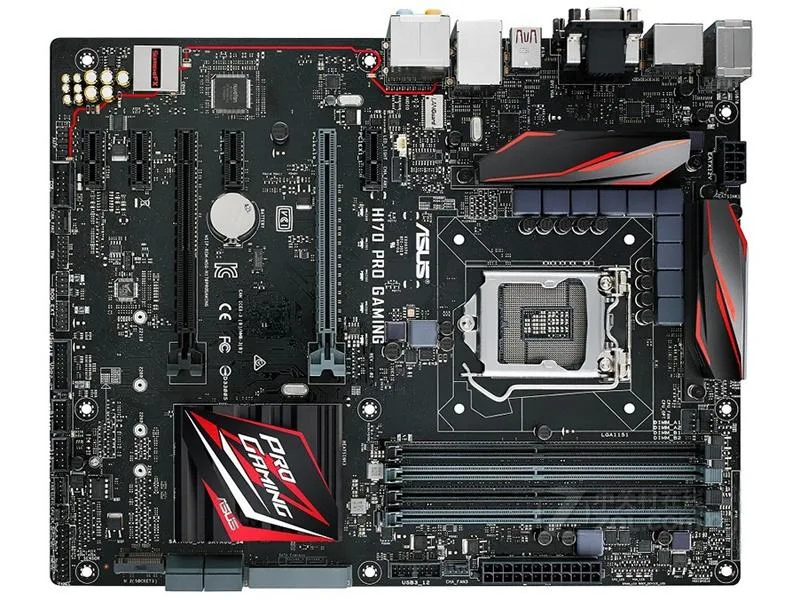 Green ATX motherboard with silver heatsinks and black slots