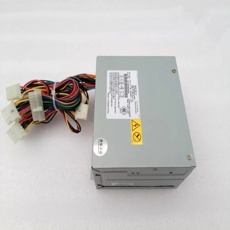 Rectangular silver ATX power supply unit with fan grille visible
