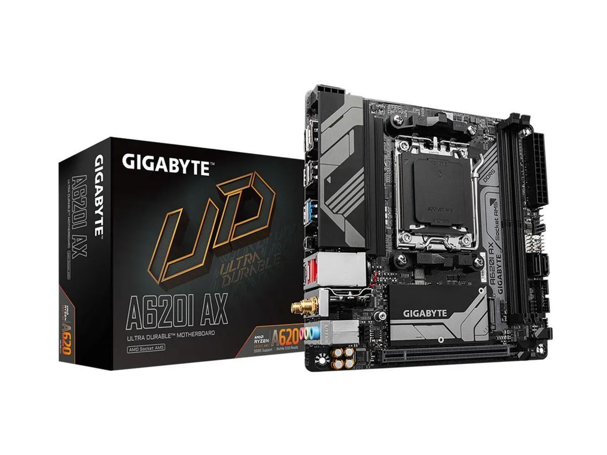 Green Mini-ITX motherboard with silver heatsinks and black I/O shield