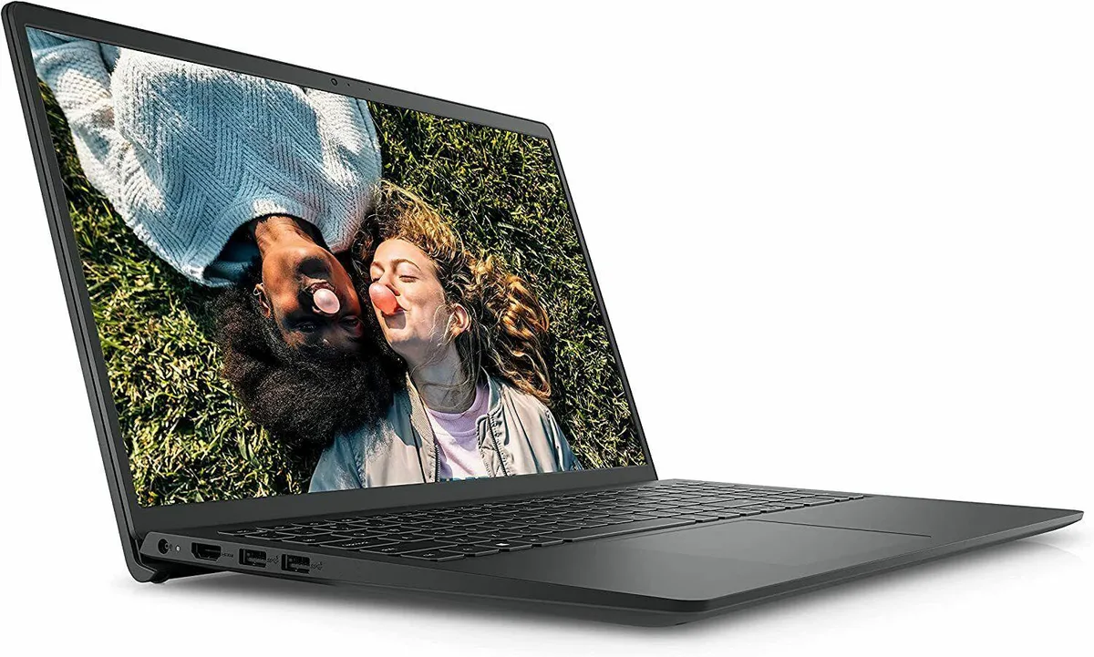 Silver Dell Inspiron 3511 laptop with 15.6 inch touchscreen display and backlit keyboard