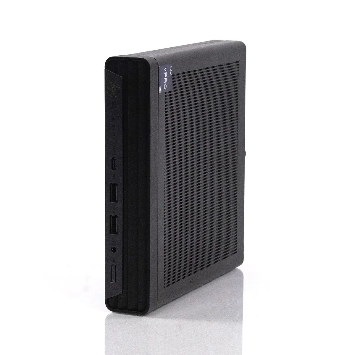 Compact silver mini desktop tower on plain background
