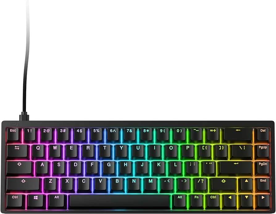 Compact black aluminium 65% keyboard with 68 doubleshot PBT keycaps and RGB lighting