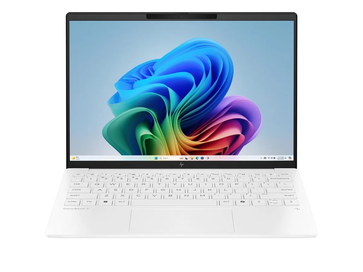 Silver ultra-light 13.3 inch laptop with thin bezels and matte finish