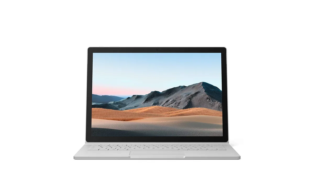Silver 13.5 inch detachable laptop with backlit keyboard and glass trackpad