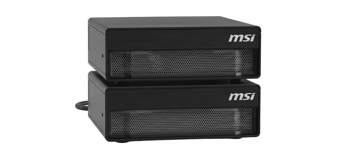 Black mini PC with wireless keyboard and mouse