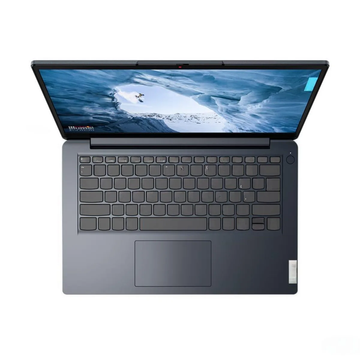 Silver 14 inch laptop closed on a plain surface
