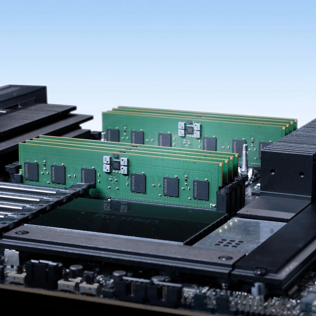 Green circuit board with black memory chips and gold connectors
