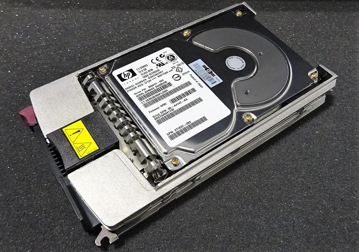 Silver 3.5 inch SCSI hard drive with circuit board visible