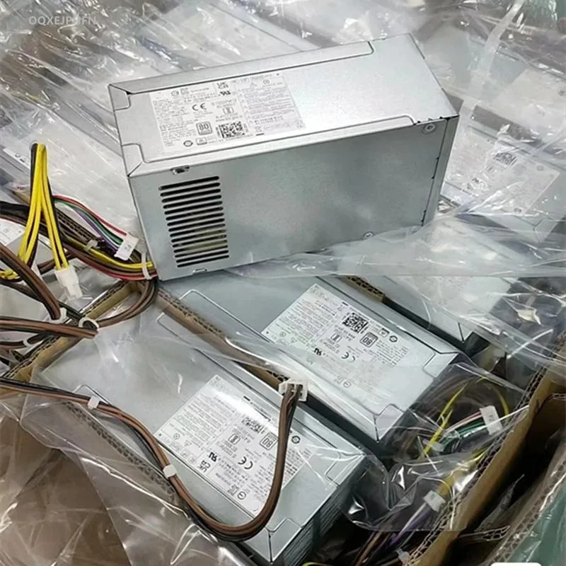 Black ATX power supply unit with cooling fan and cable bundle