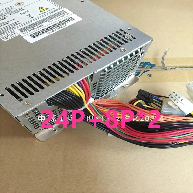 Rectangular black ATX power supply unit with fan grille and cable bundle
