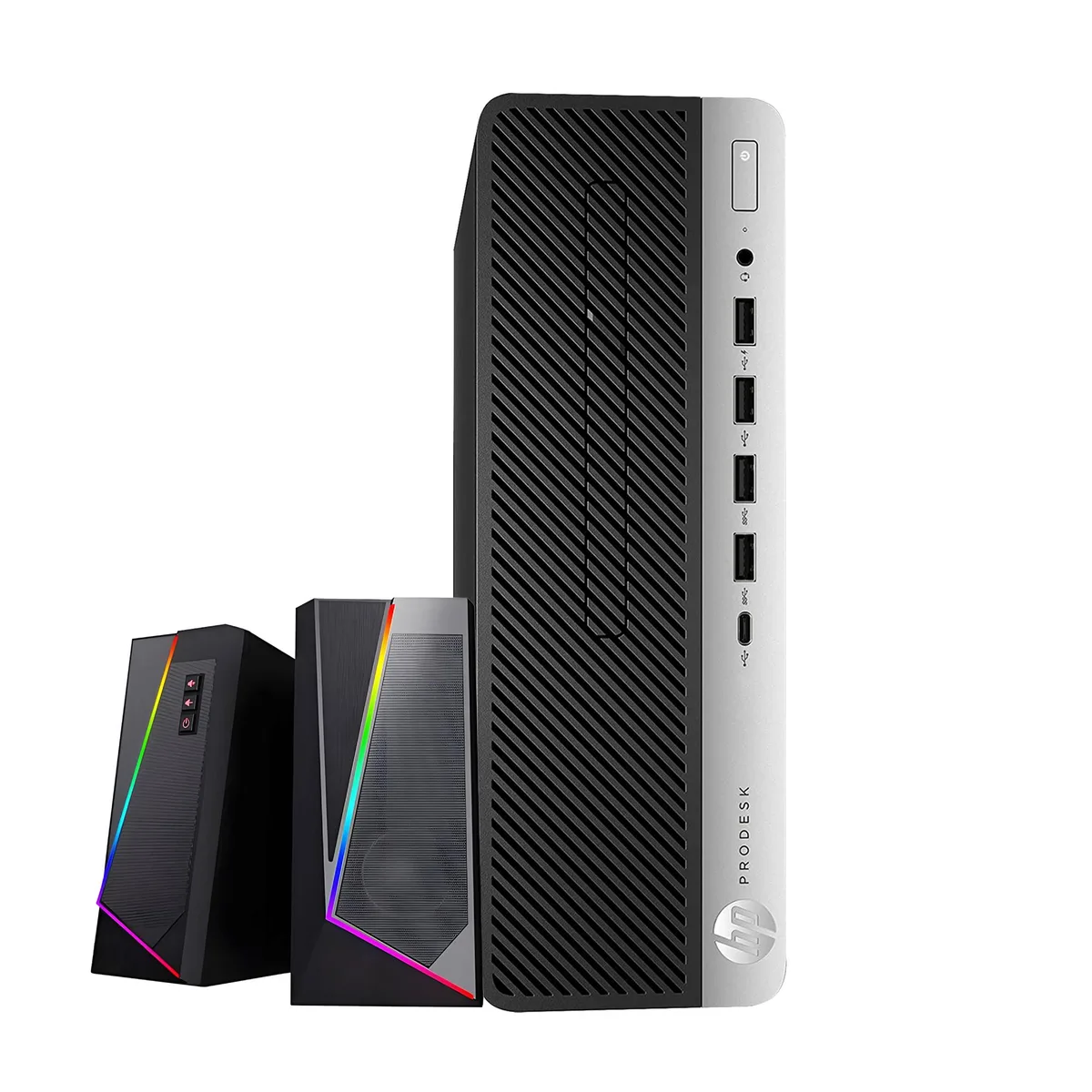 Small black and silver desktop tower with wireless keyboard and mouse