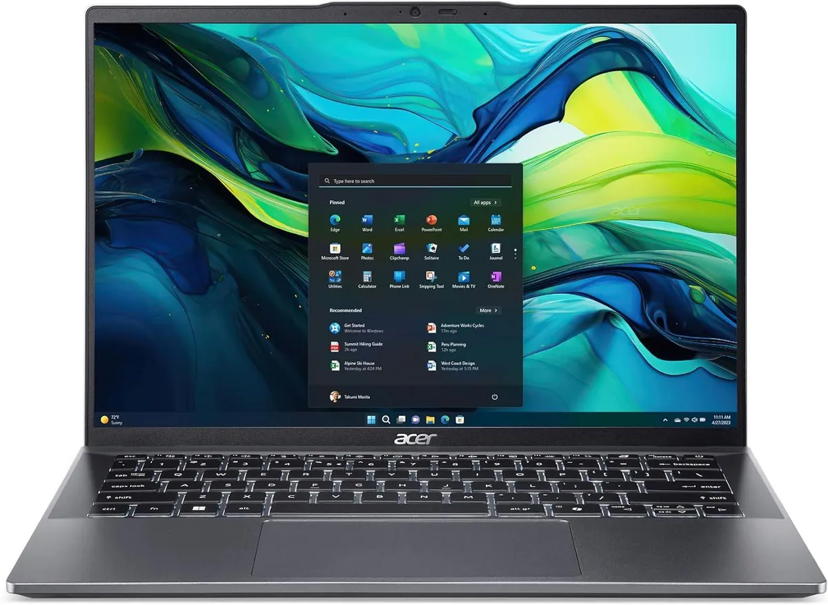 Silver-grey 14-inch touchscreen laptop, thin and light