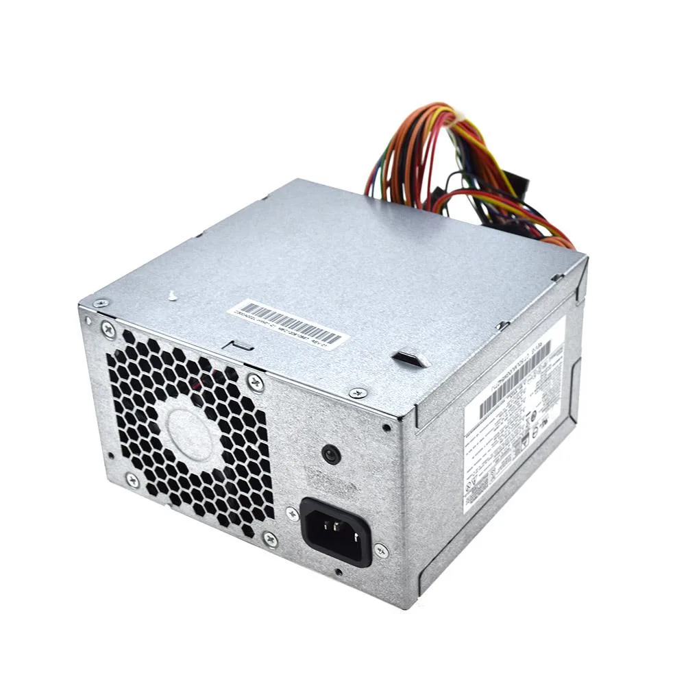 Rectangular metal ATX power supply unit with fan grille and power connectors