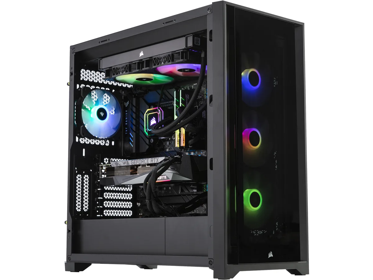 Black mid-tower gaming PC with tempered glass panels and RGB lighting visible inside