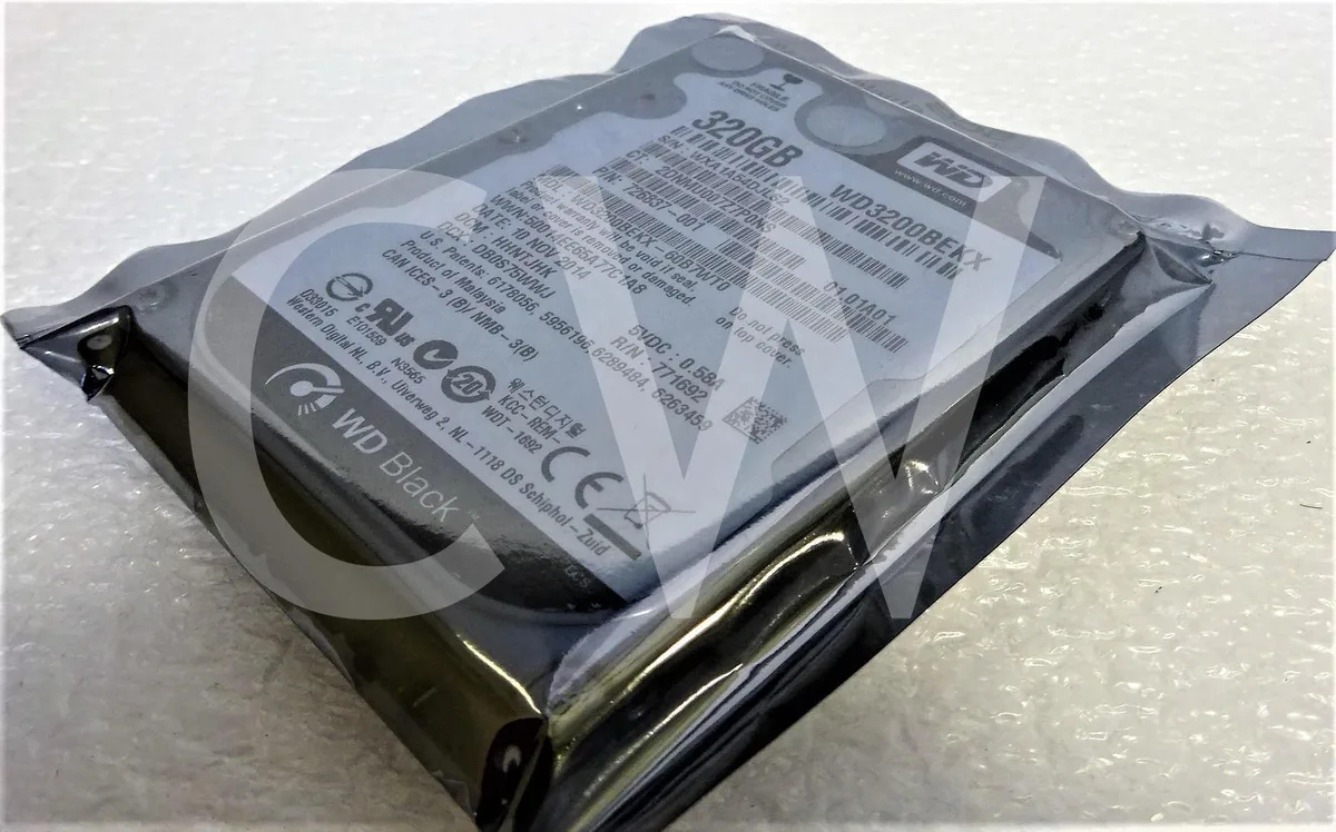 Silver rectangular 2.5 inch SATA hard drive with circuit board visible
