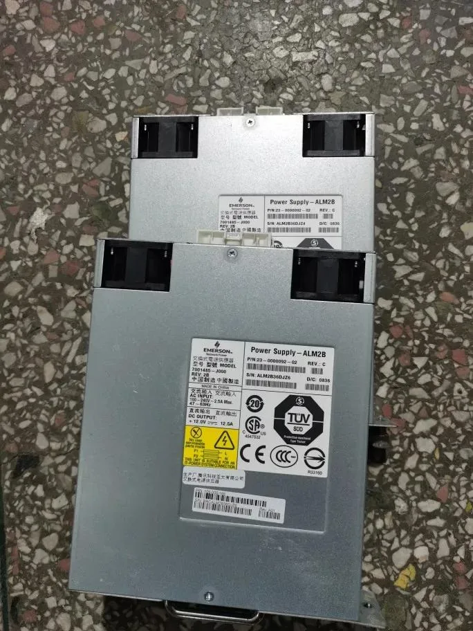 Rectangular ATX power supply unit with metal casing and ventilation grille