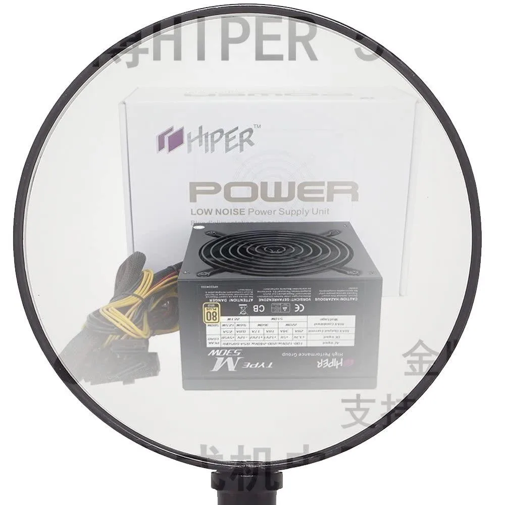 Rectangular silver AT power supply unit with fan grille and cable bundle