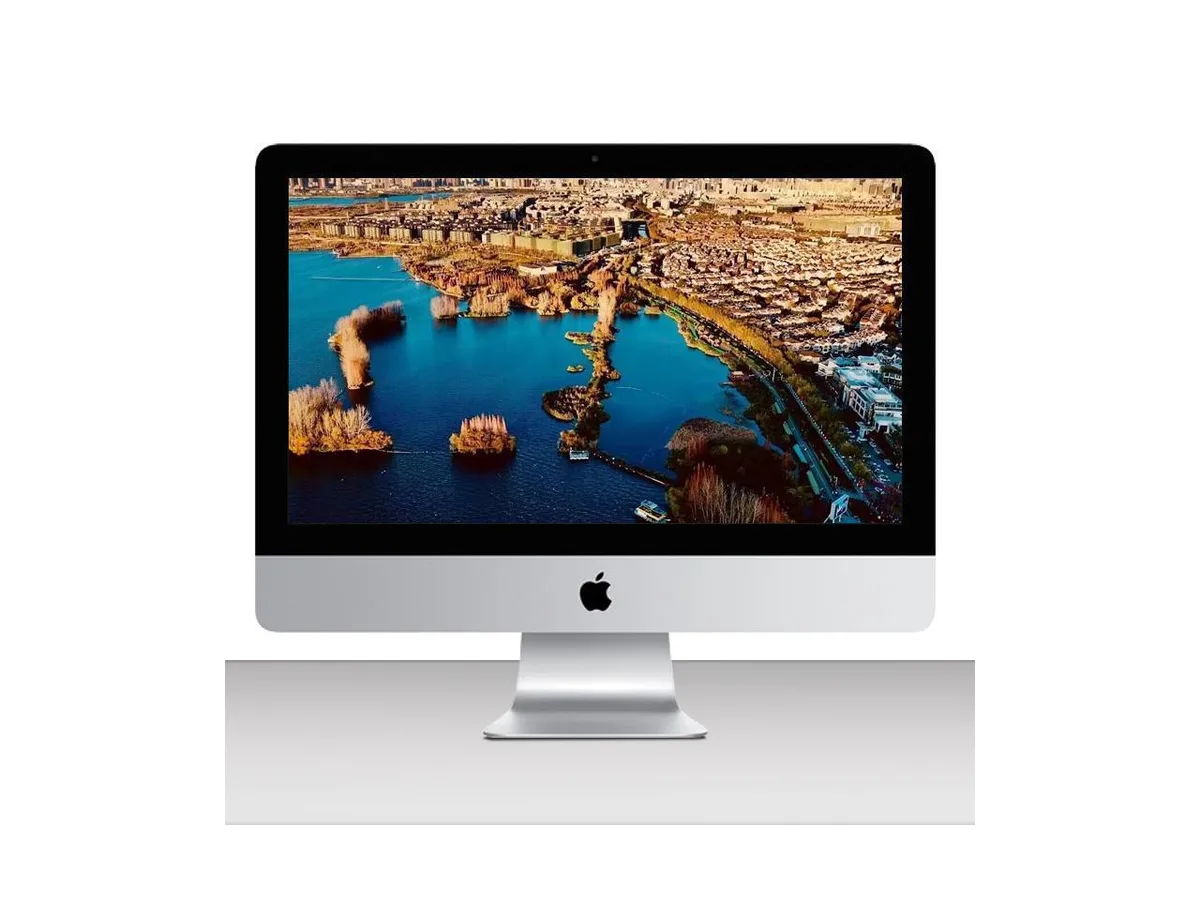 Silver all-in-one desktop with 27.5 inch Retina 5K display, tapered aluminium enclosure, keyboard and mouse included