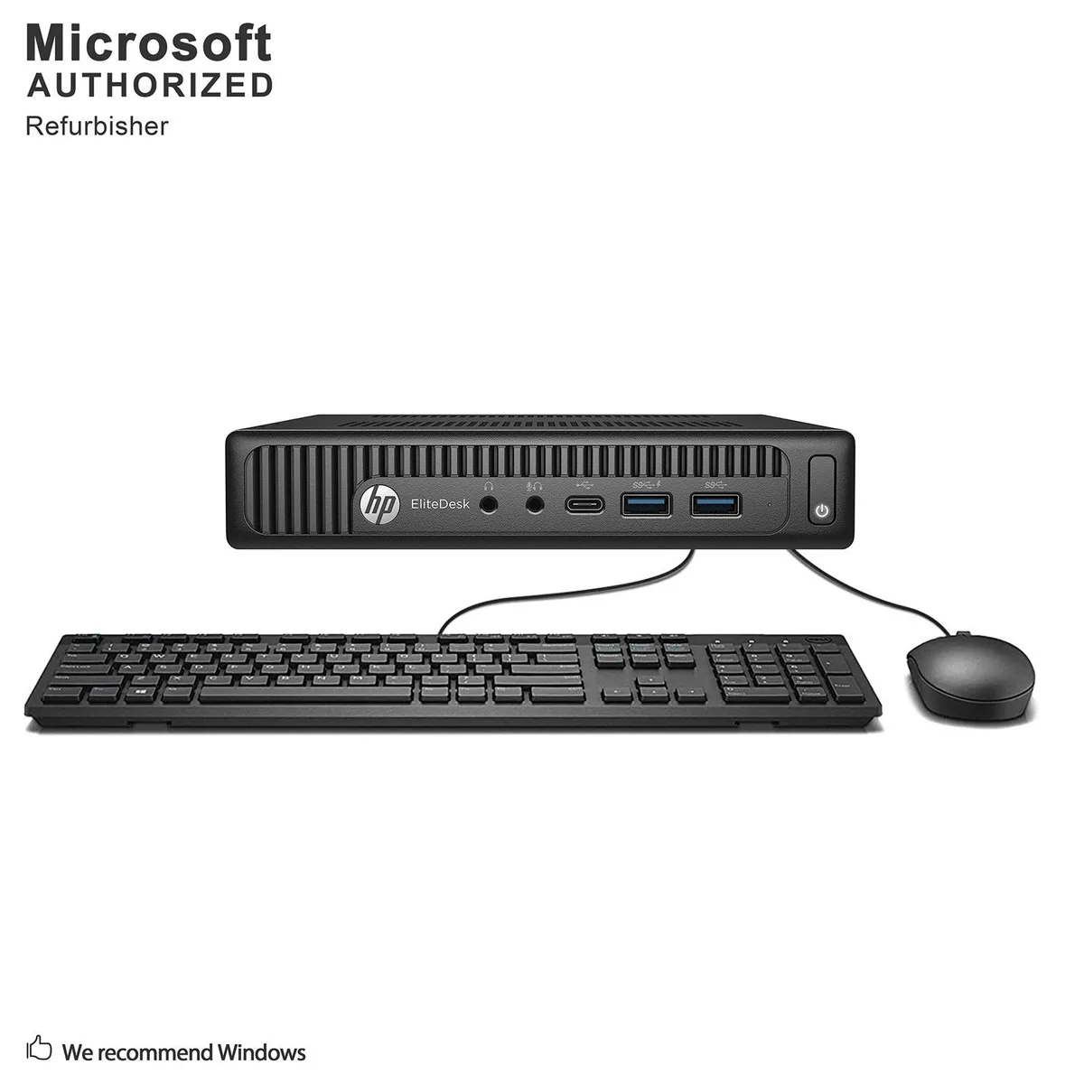 Small black desktop mini PC with keyboard and mouse