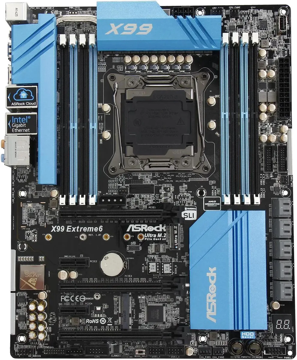 ASRock X99 Extreme6 ATX motherboard, black PCB with silver heatsinks and blue slots