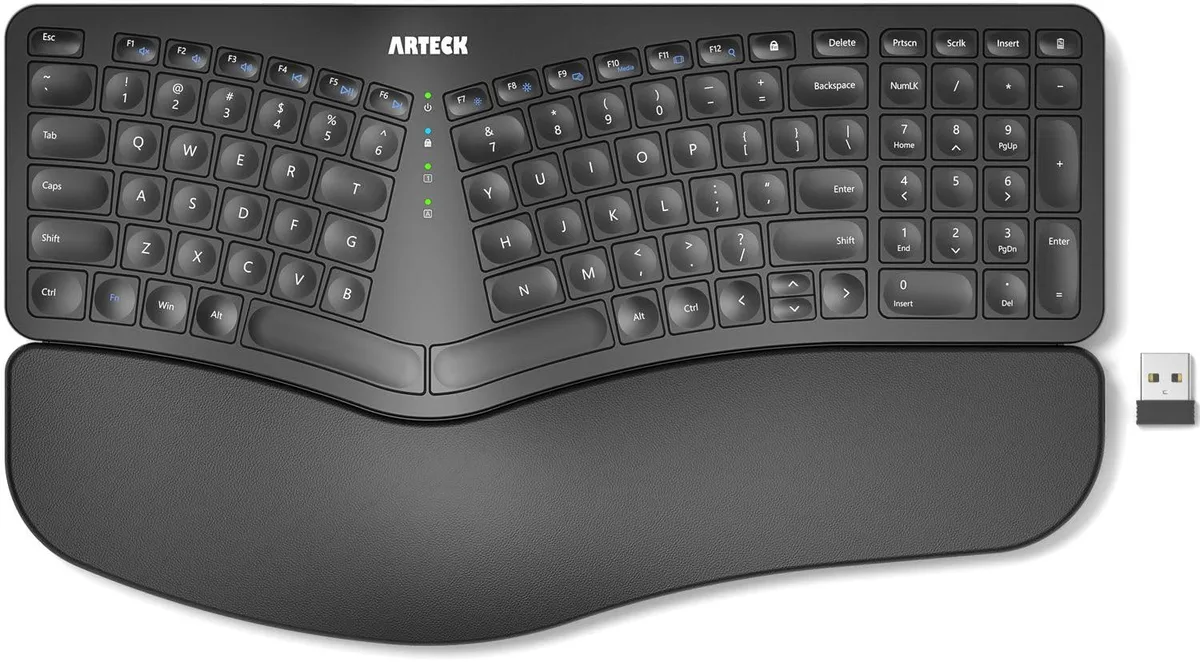 Black split ergonomic keyboard with cushioned palm rest and scissor-switch keys