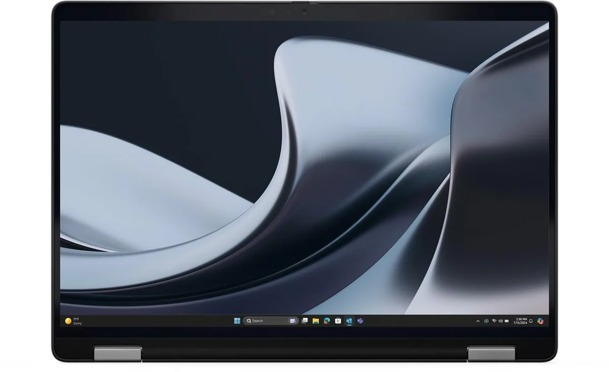 Silver aluminium 14 inch laptop closed on a plain background