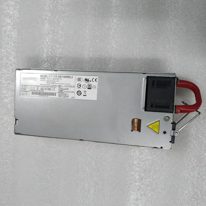 Rectangular silver server power supply unit with rear fan grille and power socket