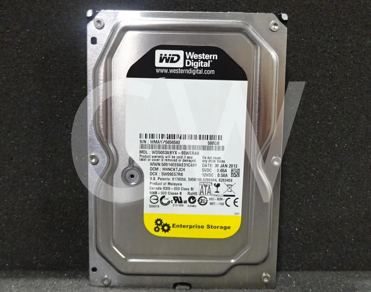 Silver 3.5 inch SATA hard drive with exposed circuit board