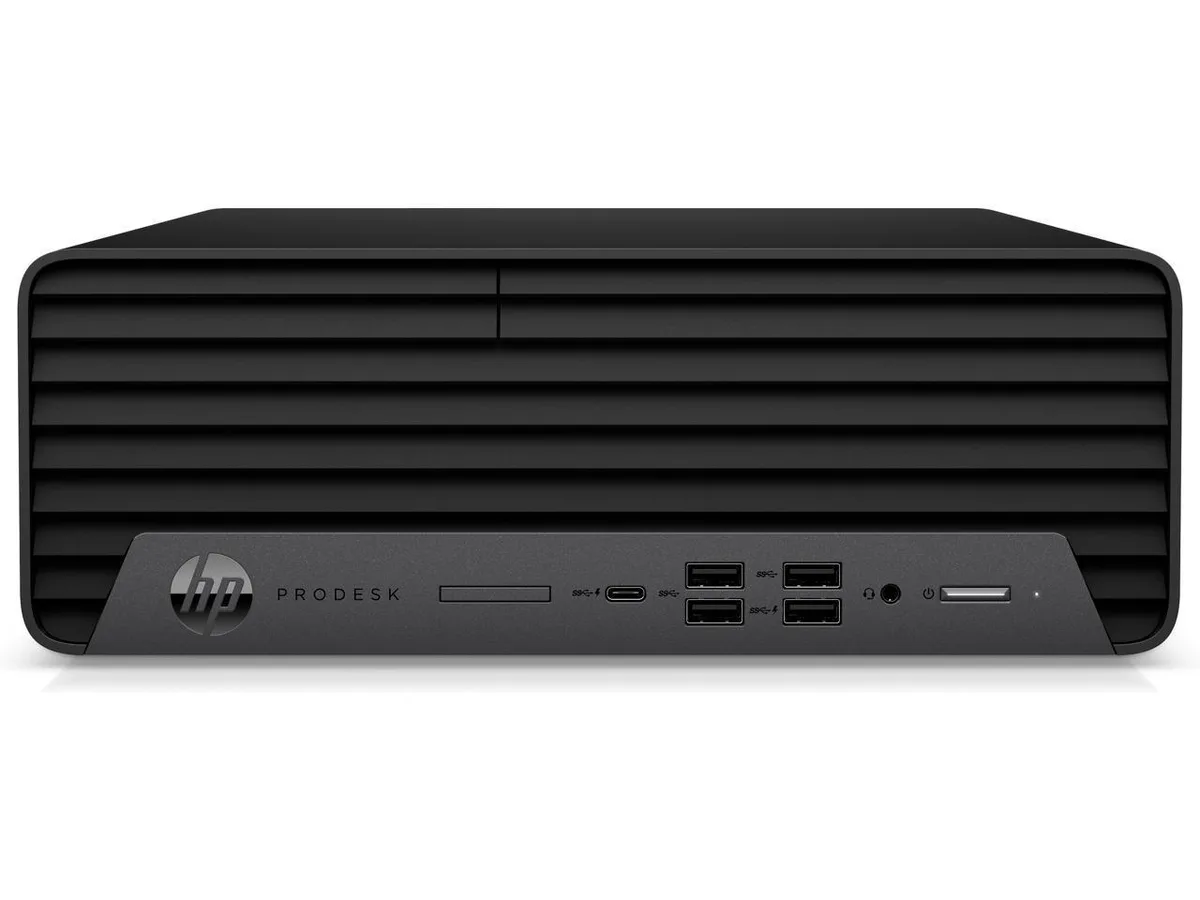 Black small-form-factor desktop tower with USB keyboard and mouse