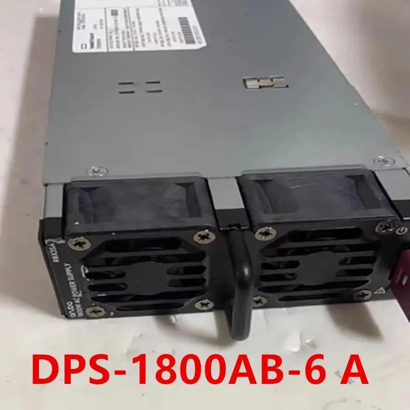 Rectangular silver ATX power supply unit with rear fan grille and modular cable sockets