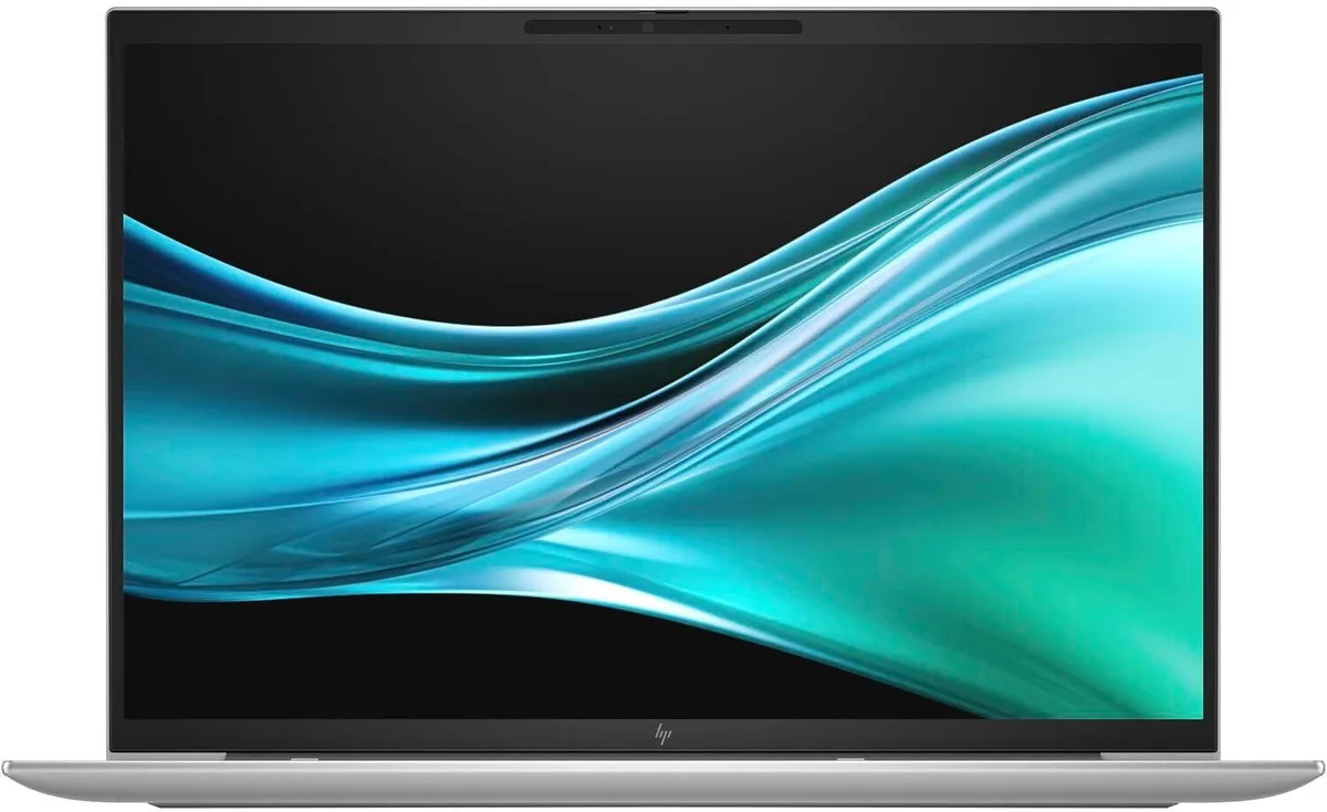Silver 16 inch laptop closed on a plain background