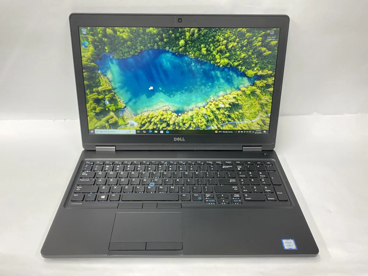 Silver Dell Latitude 5580 laptop, 15.6 inch non-touch screen, charger included