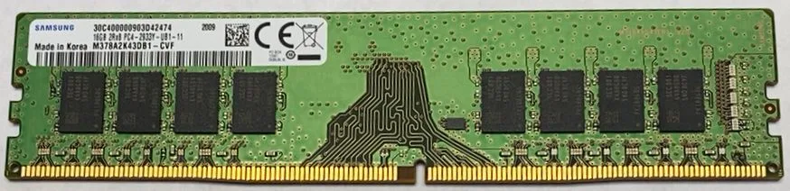 Green rectangular RAM stick with gold contacts and black chips