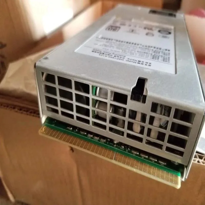 Rectangular ATX power supply unit with metal casing and cooling fan visible