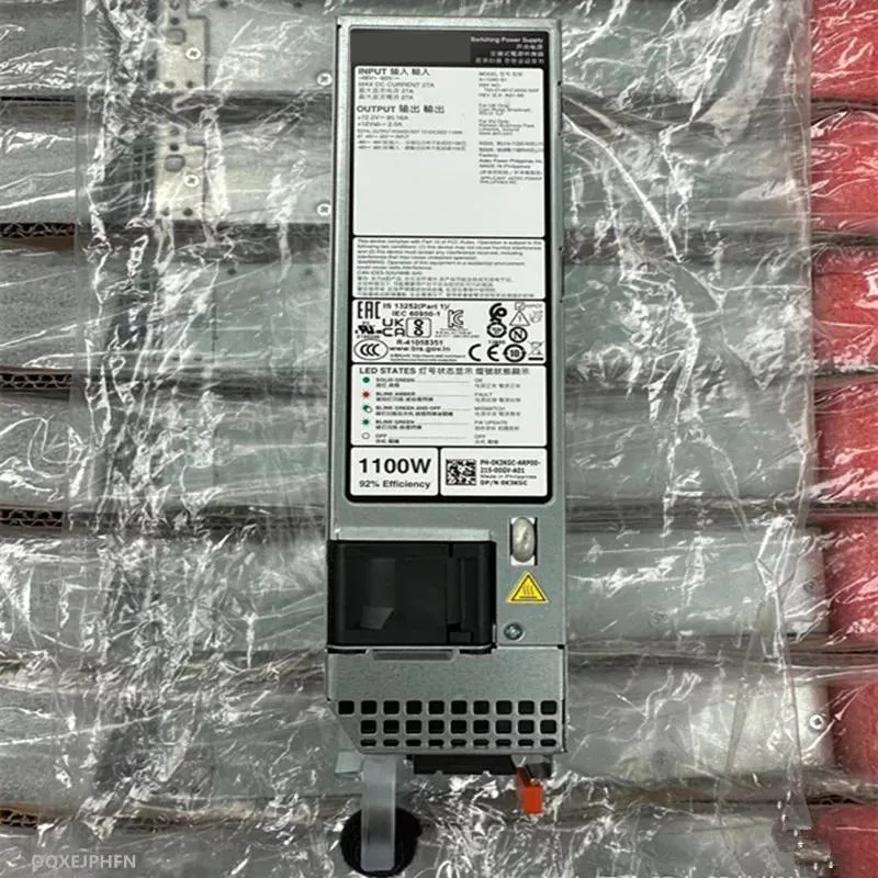 Silver rectangular ATX power supply unit with cooling fan and cable connectors