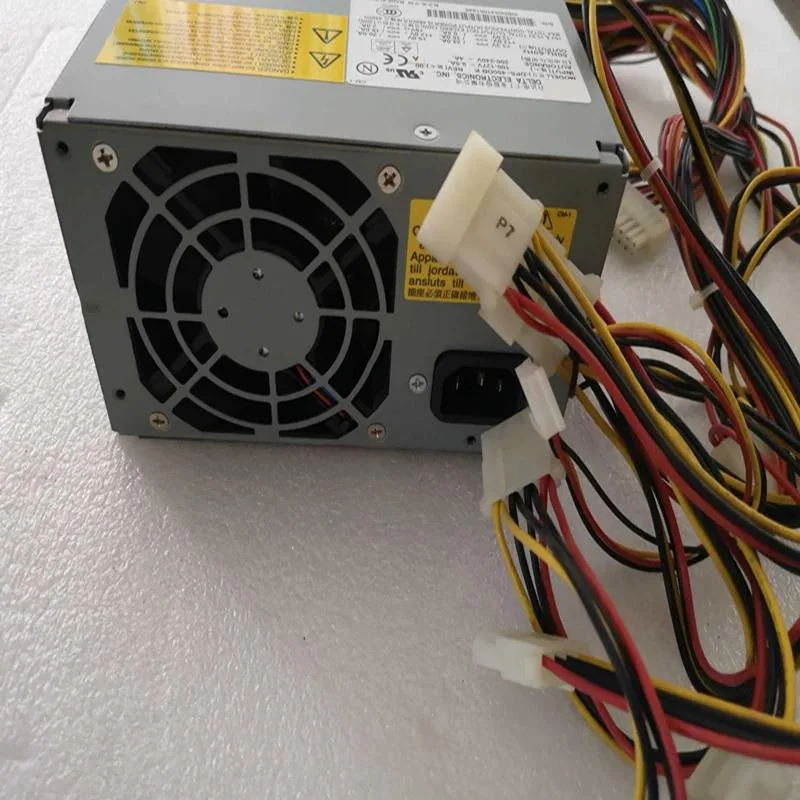 Rectangular ATX power supply unit with matte black finish, cooling fan and cable bundle visible